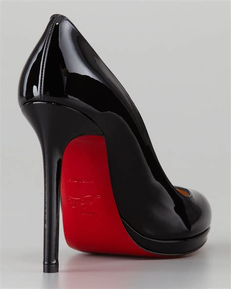 black stilettos with red soles.